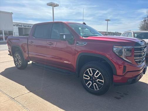 Volcanic Red Tintcoat 2026 GMC Sierra 1500 AT4