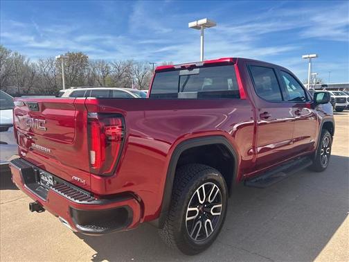 Volcanic Red Tintcoat 2026 GMC Sierra 1500 AT4