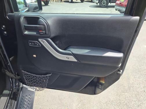 Black Clearcoat 2016 Jeep Wrangler Unlimited Sahara