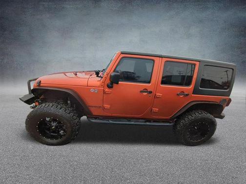 Mango Tango Pearlcoat 2011 Jeep Wrangler Unlimited Sport