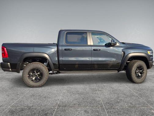 Forged Blue Metallic 2026 RAM 1500 RHO Crew Cab 4x4 5'7' Box