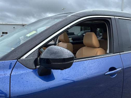 Caspian Blue Metallic/Super Black 2023 Nissan Rogue Platinum
