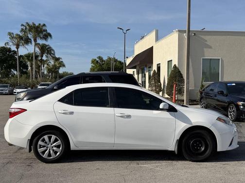 Super White 2016 Toyota Corolla LE