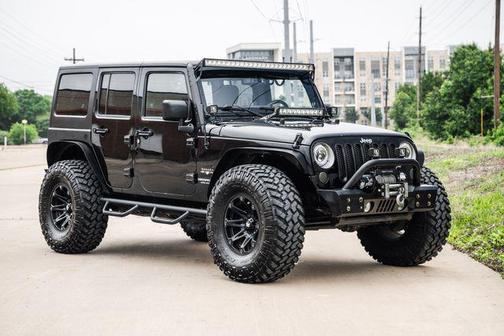 Black Clearcoat 2016 Jeep Wrangler Unlimited Sahara