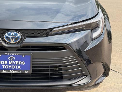 Midnight Black Metallic 2025 Toyota Corolla Hybrid LE