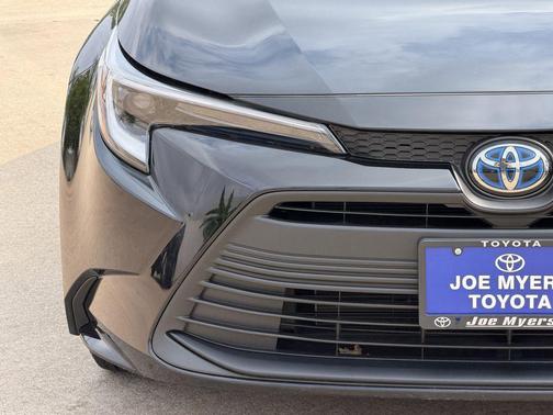 Midnight Black Metallic 2025 Toyota Corolla Hybrid LE