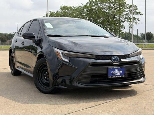 Midnight Black Metallic 2025 Toyota Corolla Hybrid LE