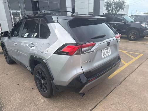 Silver Sky Metallic/Midnight Black Metallic 2025 Toyota RAV4 Hybrid SE