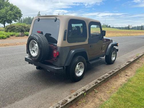 Maroon 2002 Jeep Wrangler Sport
