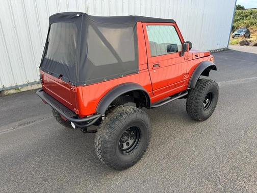 Orange 1988 Suzuki Samurai JA AWD convertible