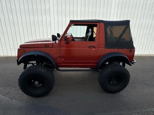 Orange 1988 Suzuki Samurai JA AWD convertible