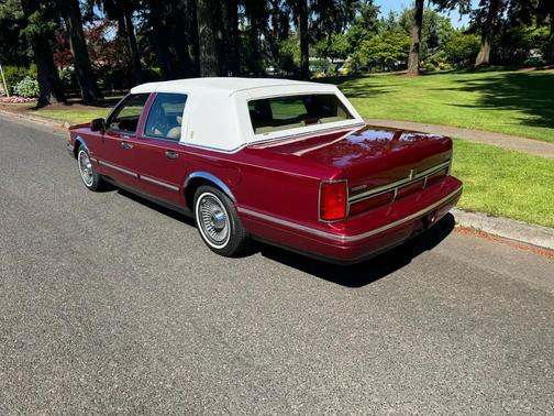 Maroon 1996 Lincoln Town Car Signature