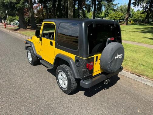 Yellow 2006 Jeep Wrangler Sport