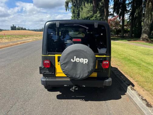 Yellow 2006 Jeep Wrangler Sport