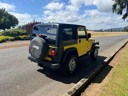 Yellow 2006 Jeep Wrangler Sport