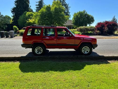 Red 2000 Jeep Cherokee Sport 4WD