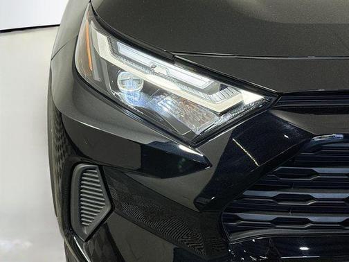 Midnight Black Metallic 2024 Toyota RAV4 Hybrid LE