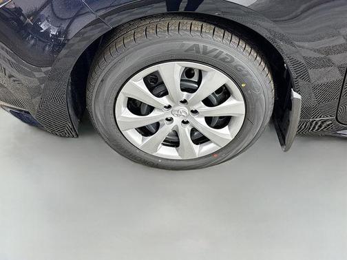 Midnight Black Metallic 2026 Toyota Corolla Hybrid LE