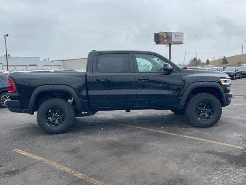 Diamond Black Crystal Pearlcoat 2026 RAM 1500 RHO Crew Cab 4x4 5'7' Box