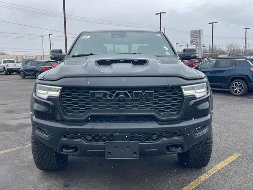 Diamond Black Crystal Pearlcoat 2026 RAM 1500 RHO Crew Cab 4x4 5'7' Box