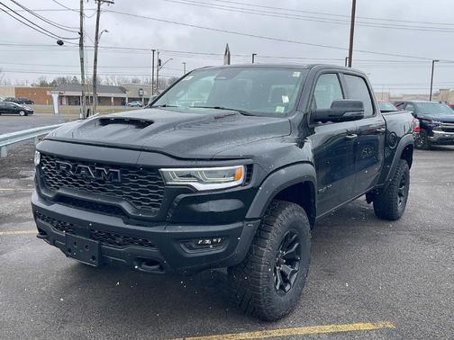 Diamond Black Crystal Pearlcoat 2026 RAM 1500 RHO Crew Cab 4x4 5'7' Box