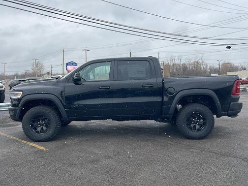 Diamond Black Crystal Pearlcoat 2026 RAM 1500 RHO Crew Cab 4x4 5'7' Box