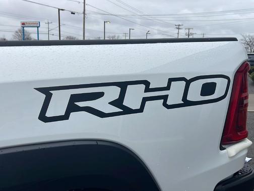 Bright White Clearcoat 2026 RAM 1500 RHO Crew Cab 4x4 5'7' Box