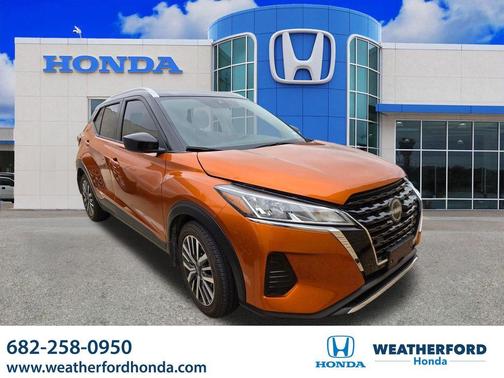 Monarch Orange / Super Black 2024 Nissan Kicks SV