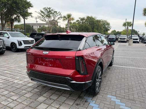 Radiant Red Tintcoat 2025 Cadillac OPTIQ Sport 2 AWD