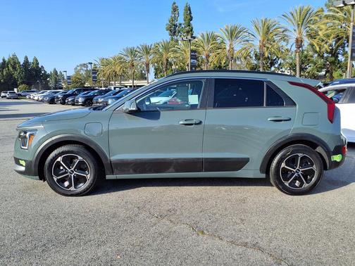 Cityscape Green 2023 Kia Niro Plug-In Hybrid EX