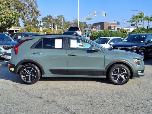 Cityscape Green 2023 Kia Niro Plug-In Hybrid EX