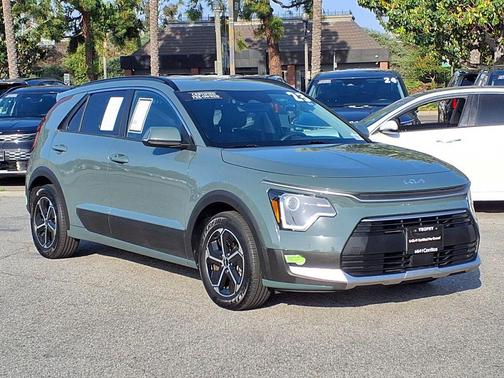 Cityscape Green 2023 Kia Niro Plug-In Hybrid EX