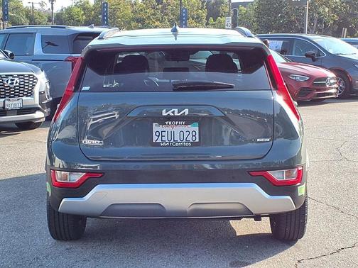 Cityscape Green 2023 Kia Niro Plug-In Hybrid EX