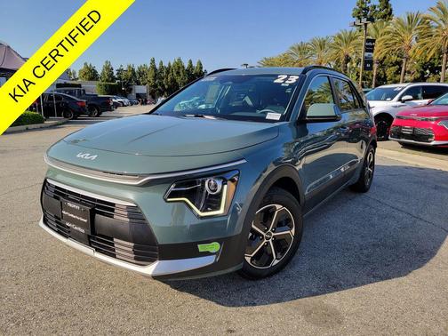 Cityscape Green 2023 Kia Niro Plug-In Hybrid EX
