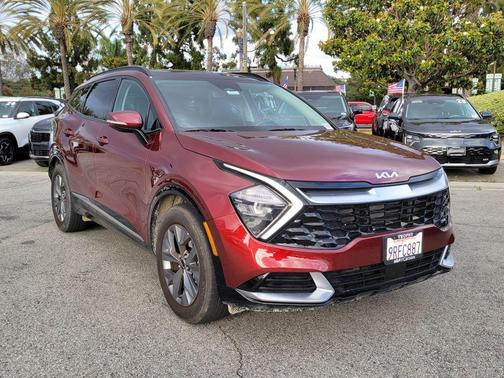 Dawning Red 2023 Kia Sportage SX