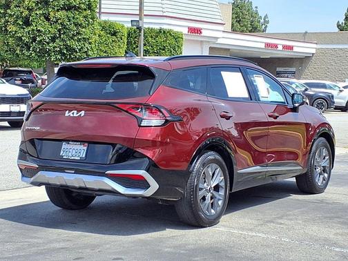 Dawning Red 2023 Kia Sportage SX