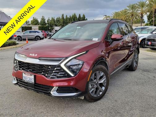 Dawning Red 2023 Kia Sportage SX