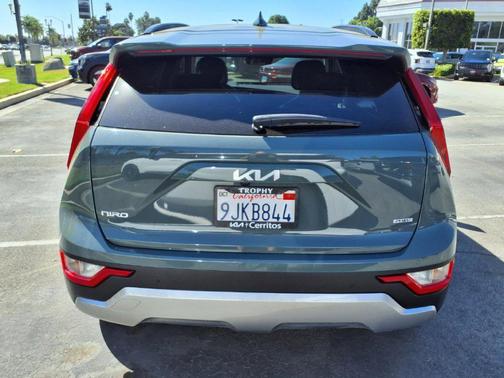 Cityscape Green 2023 Kia Niro Plug-In Hybrid EX