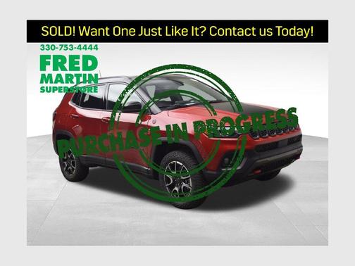 Red 2026 Jeep Compass Trailhawk