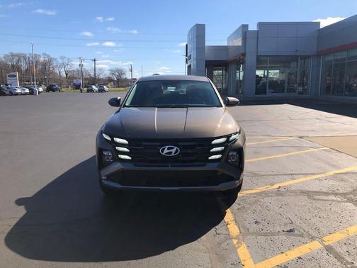 Cashmere Bronze 2026 Hyundai TUCSON Hybrid Blue SE