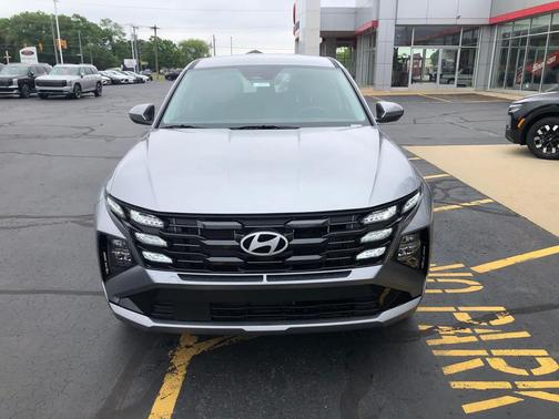 Shimmering Silver 2026 Hyundai TUCSON Hybrid Blue SE