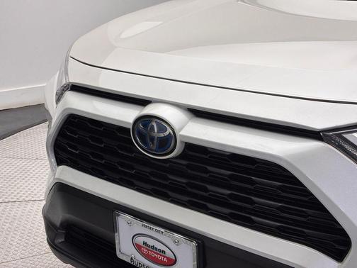 Blizzard Pearl 2022 Toyota RAV4 Hybrid XLE Premium