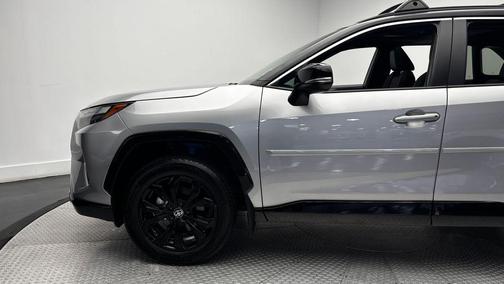Silver Sky Metallic/Midnight Black Metallic 2025 Toyota RAV4 Hybrid SE