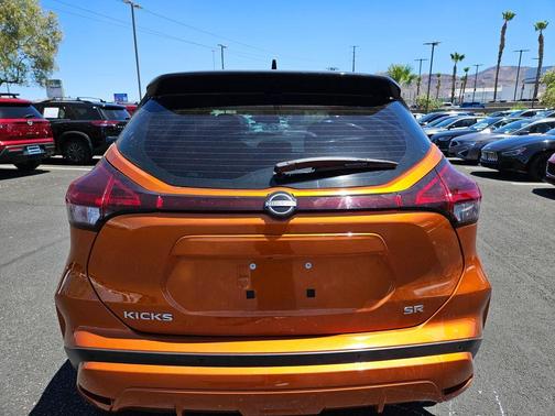 Monarch Orange / Super Black 2023 Nissan Kicks SR