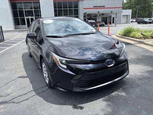 Midnight Black Metallic 2024 Toyota Corolla Hybrid SE