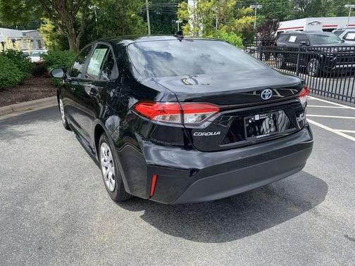 Midnight Black Metallic 2024 Toyota Corolla Hybrid SE