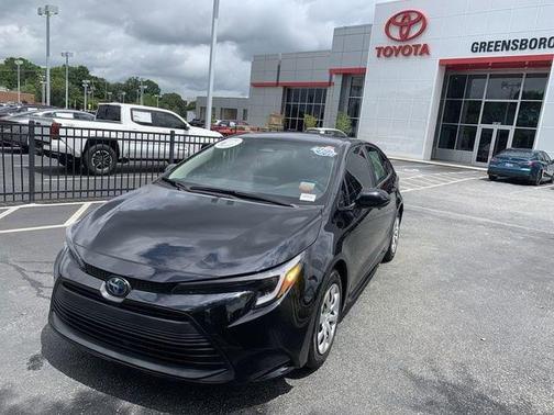 Midnight Black Metallic 2024 Toyota Corolla Hybrid SE