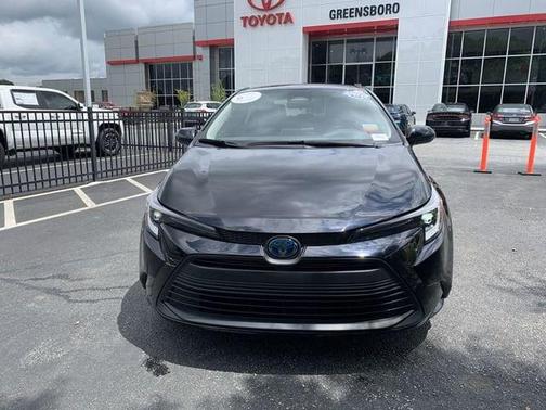 Midnight Black Metallic 2024 Toyota Corolla Hybrid SE
