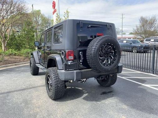 Black Clearcoat 2013 Jeep Wrangler Unlimited Sahara