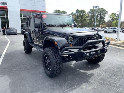 Black Clearcoat 2013 Jeep Wrangler Unlimited Sahara